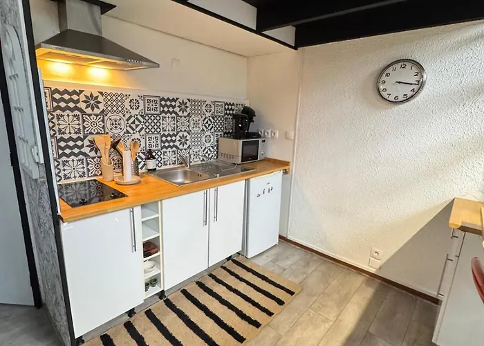 Les 4 Piliers Lägenhet